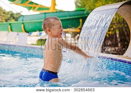 Child Sports In A Childrens Outdoor Pool