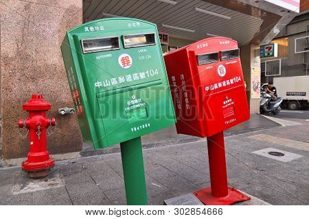 Taipei, Taiwan - December 4, 2018: Mailboxes Bent During Typhoon In Taipei, Taiwan. The Twisted Mail
