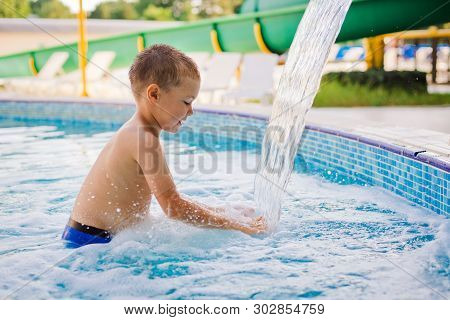 Child Sports In A Childrens Outdoor Pool