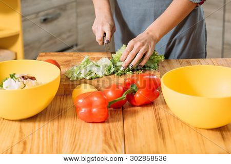 Healthy Nutrition. True Vegetarian Lifestyle. Cropped Shot Of Lady Chopping Lettuce, Making Salad Wi