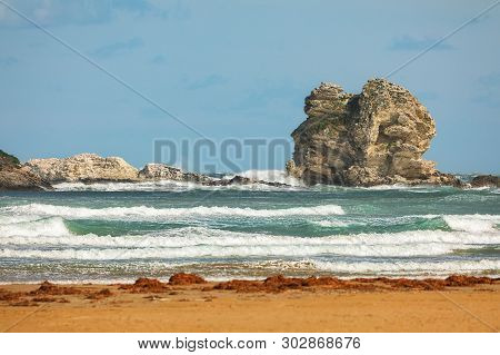 Gattarella Islet Or Portonuovo Rock. Gargano Coast: Portonuovo Beach,vieste,apulia, Italy