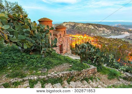 Sunset Over Old Famous Medieval Village Stilo In Calabria. View On Church And City. Southern Italy. 