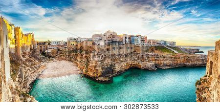 Sunset At Cala Paura Gulf With Bastione Di Santo Stefano And Lama Monachile Beach In Background. Pol