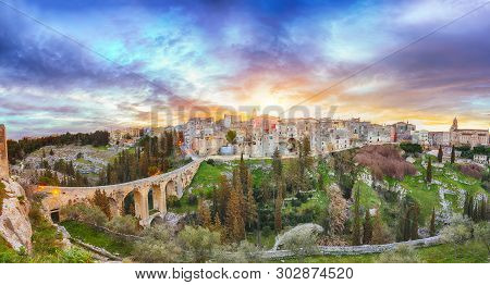 Gravina In Puglia Ancient Town, Bridge And Canyon At Sunrise. Panoramic View Of Old City Gravina In 