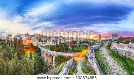 Gravina In Puglia Ancient Town, Bridge And Canyon At Sunrise. Panoramic View Of Old City Gravina In 