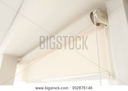 Window With Modern Roll Blinds In Room, Closeup