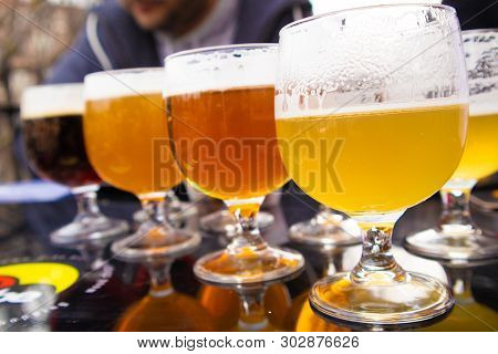 Glasses With Beer Degustation In Bruges, Belgian, Europe