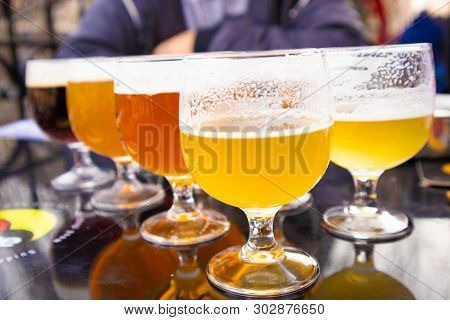 Glasses With Beer Degustation In Bruges, Belgian, Europe