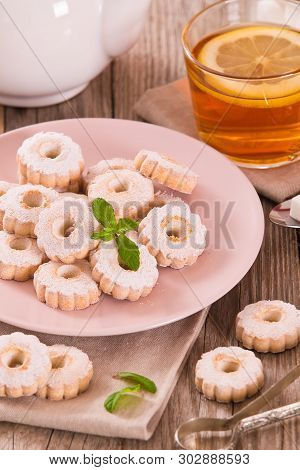 Canestrelli Biscuits With Mint On White Dish.