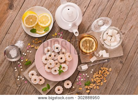 Canestrelli Biscuits With Mint On White Dish.