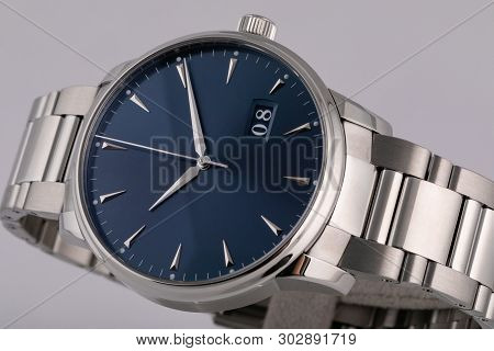 Mens Silver Watch With A Blue Dial, Silver Clockwise, Chronograph, With A Steel Strap Isolated On Wh