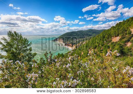 Picturesque Islets Faraglioni Di Puglia In Summer Adriatic Sea Bay Baia Delle Zagare. Mattinata Fara