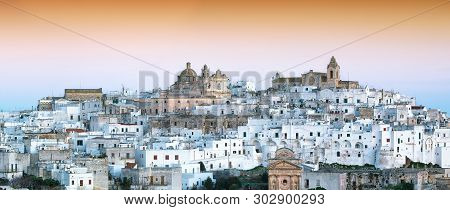 Ostuni White Town Skyline At Sunrise. Brindisi, Apulia Southern Italy. Europe.