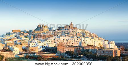 Ostuni White Town Skyline At Sunrise. Brindisi, Apulia Southern Italy. Europe.