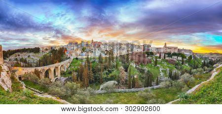 Gravina In Puglia Ancient Town, Bridge And Canyon At Sunrise. Panoramic View Of Old City Gravina In 