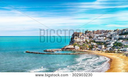 Picturesque Peschici With Wide Sandy Beach In Puglia, Adriatic Coast Of Italy. Location Peschici, Ga