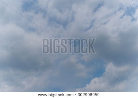 Beautiful Bright Blue Sky With White Fluffy Clouds On A Clear Sunny Day. Royalty High-quality Free S