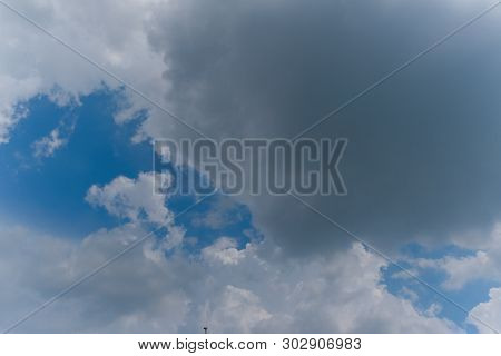 Beautiful Bright Blue Sky With White Fluffy Clouds On A Clear Sunny Day. Royalty High-quality Free S