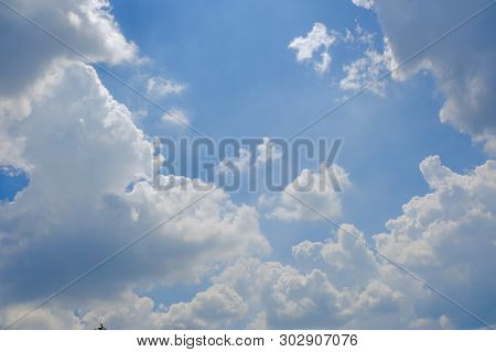 Beautiful Bright Blue Sky With White Fluffy Clouds On A Clear Sunny Day. Royalty High-quality Free S