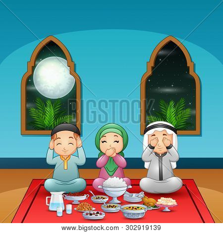 Muslim Family Pray Together Before Break Fasting