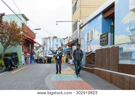 Busan, South Korea - April 2019: Tourists Visiting Gamcheon Culture Village, Famous Attraction With