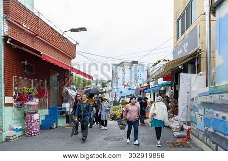 Busan, South Korea - April 2019: Tourists Visiting Gamcheon Culture Village, Famous Attraction With