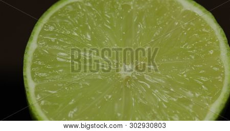 Delicious Lime Fruit Cut For Squeezing Fresh Juice, Citrus Fruit In Healthy Menu. Vitamin C Source, 