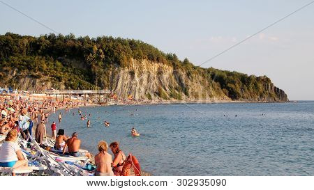 Olginka, Russia - May 24, 2019: Holidaymakers On The Beach, Olginka Village, Tuapse, The Black Sea, 
