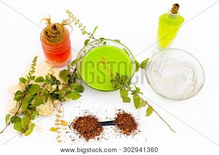 Basil Face Pack Isolated On White I.e. Sandalwood Powder Well Mixed With Tulsi,rose Water,olive Oil,