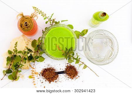 Basil Face Pack Isolated On White I.e. Sandalwood Powder Well Mixed With Tulsi,rose Water,olive Oil,