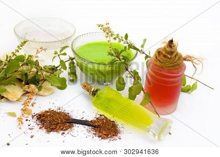 Basil Face Pack Isolated On White I.e. Sandalwood Powder Well Mixed With Tulsi,rose Water,olive Oil,