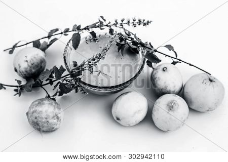 Lemon Face Pack Isolated On White I.e. Lime Juice Well Mixed With Tulsi Or Holy Basil's Juice.used F