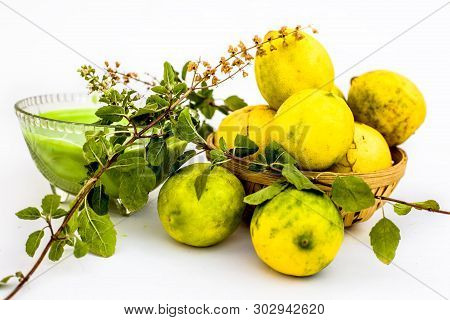 Lemon Face Pack Isolated On White I.e. Lime Juice Well Mixed With Tulsi Or Holy Basil's Juice.used F
