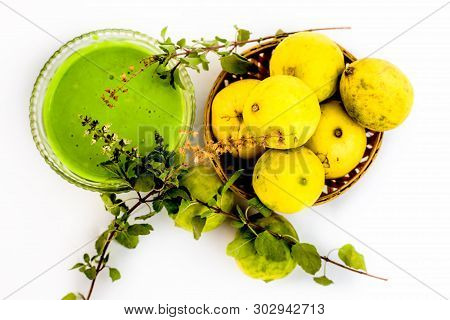 Lemon Face Pack Isolated On White I.e. Lime Juice Well Mixed With Tulsi Or Holy Basil's Juice.used F