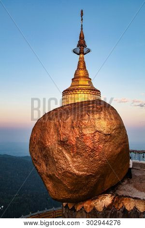 Kyaiktiyo Pagoda Also Known As Golden Rock Is A Well-known Buddhist Pilgrimage Site In Myanmar, Nigh