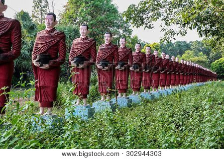 Buddhist Monks Stone Statues Row At Kaw Ka Thaung Cave, Hpa-an, Myanmar