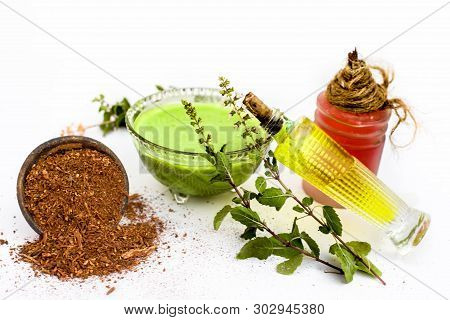 Tulsi Face Pack Isolated On White Consisting Of Sandal Wood Powder Well Mixed With Tulsi Leaves With