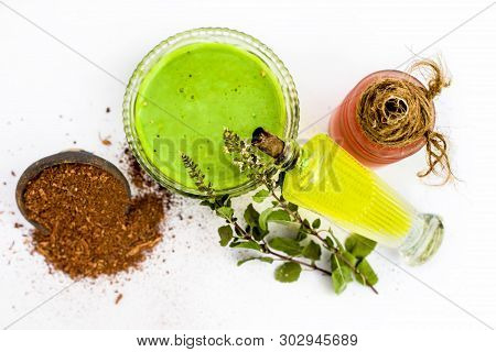 Tulsi Face Pack Isolated On White Consisting Of Sandal Wood Powder Well Mixed With Tulsi Leaves With
