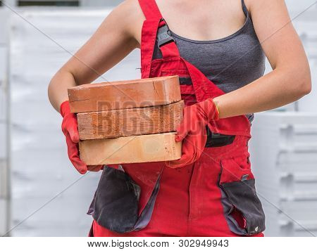 Woman Working With Bricks