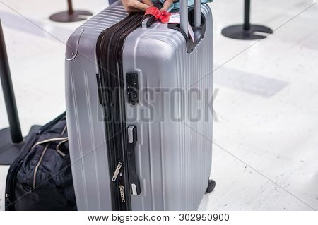 Sillver Suitcases Or Baggage Holder Tag Blank At Front Airport Departure Lounge, Traveler Luggage Te