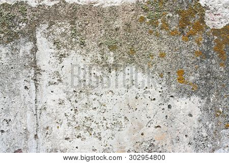 Concrete Wall Fragment. Old Dirty Cement Texture With Defects. Grunge Surface With Cracks And Weathe