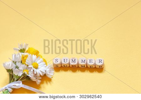 Bouquet Flower Camomila With Text Summer On Yellow Background. Summer Consept Background