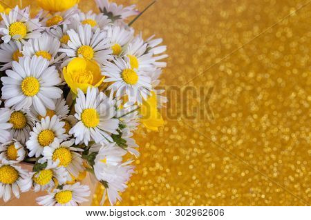 Bouquet Flower Camomila On Yellow Background. Summer Consept Background