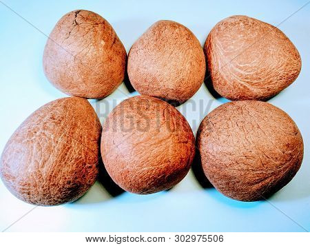 A Picture Of Coconuts On White Background