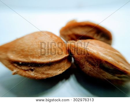 A Picture Of Almonds On White Background