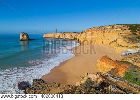 The famous beach of Praia dos Caneiros. This beach is a part of famous tourist region of Algarve.