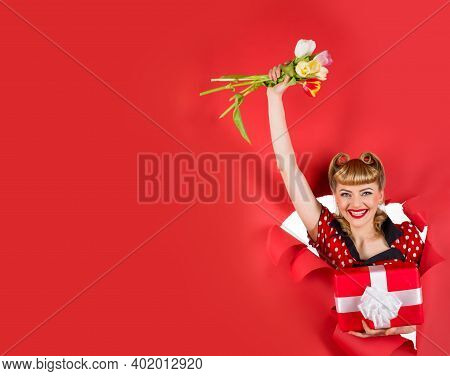 Advertising. Pin Up Girl With Flowers. Smiling Retro Woman Hold Flowers Through Hole In Paper. Woman
