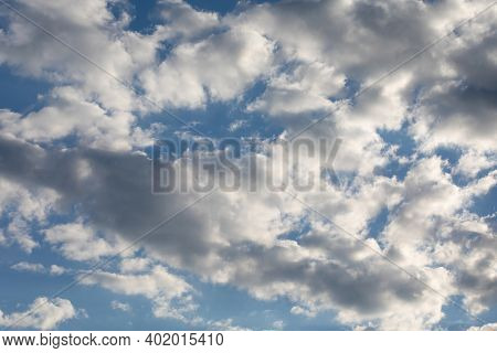 Bright Sunny Day, Cloudscape Full Of White Fluffy Cummulus Clouds, Natural Colors