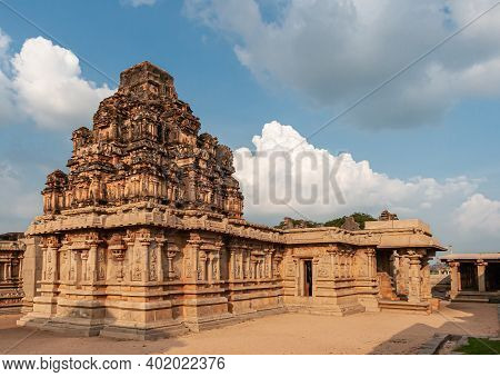 Hampi, Karnataka, India - November 4, 2013: Hazara Rama Temple. Warm Brown Stone Vimanam During Suns
