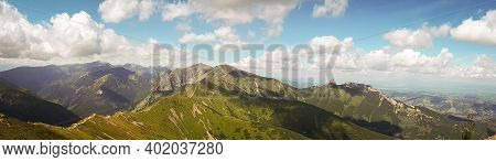Summer Panoramic View Of Tatra Mountains, Kasprowy Wierch. Panorama Landscape. Hiking Concept Scener